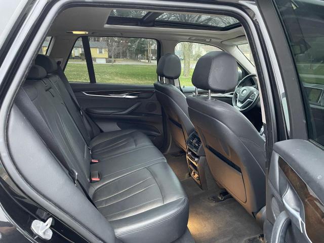 Photo 6 from auction – 2015 BMW X5 XDRIVE3 with VIN 5UXKR0C5XF0P03554