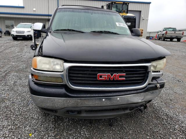 Photo 5 from auction – 2001 GMC YUKON with VIN 1GKEC13TX1R150319