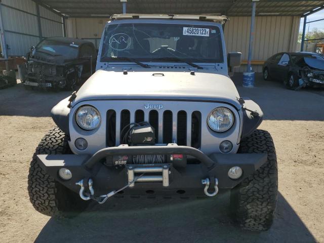 Photo 5 from auction – 2016 JEEP WRANGLER U with VIN 1C4BJWDG1GL273344