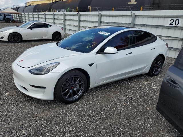 TESLA MODEL 3 2021 with VIN 5YJ3E1EA0MF099514 - Photo from auction