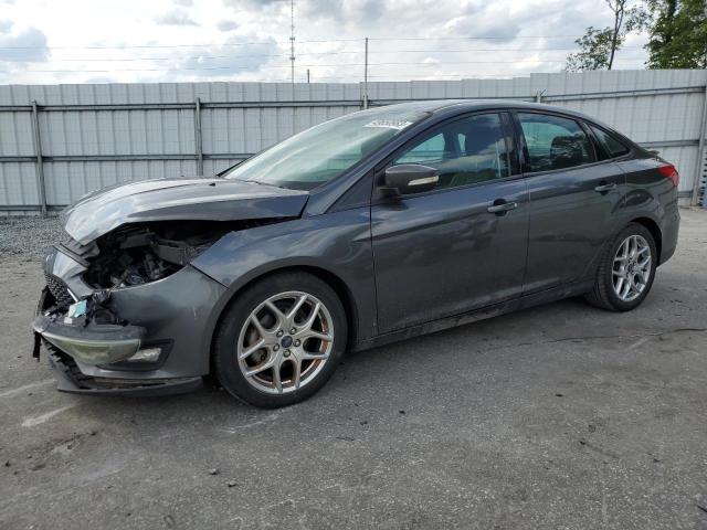 FORD FOCUS SE 2015 with VIN 1FADP3F2XFL310919 - Photo from auction