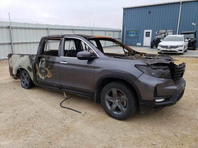 Photo 4 from auction – 2021 HONDA RIDGELINE with VIN 5FPYK3F72MB010675