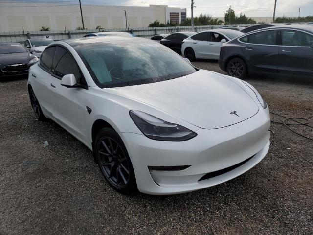 Photo 4 from auction – 2021 TESLA MODEL 3 with VIN 5YJ3E1EA8MF046155