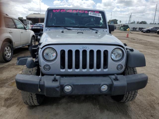 Photo 5 from auction – 2014 JEEP WRANGLER U with VIN 1C4BJWDG3EL250242
