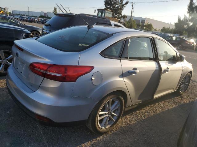Photo 3 from auction – 2018 FORD FOCUS SE with VIN 1FADP3F20JL21223