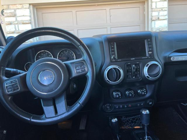 Photo 9 from auction – 2014 JEEP WRANGLER U with VIN 1C4BJWEG3EL205977