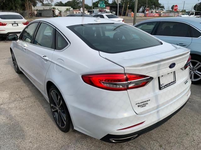 Photo 3 from auction – 2019 FORD FUSION TIT with VIN 3FA6P0D92KR106134