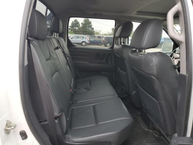 Photo 10 from auction – 2014 HONDA RIDGELINE with VIN 5FPYK1F67EB008238