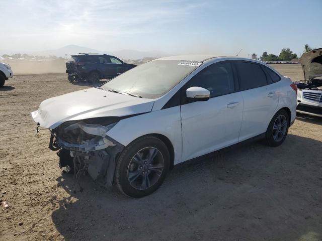 FORD FOCUS SE 2014 with VIN 1FADP3F25EL300250 - Photo from auction