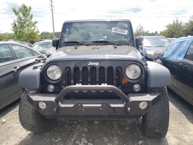 Photo 5 from auction – 2015 JEEP WRANGLER U with VIN 1C4BJWDG9FL555018