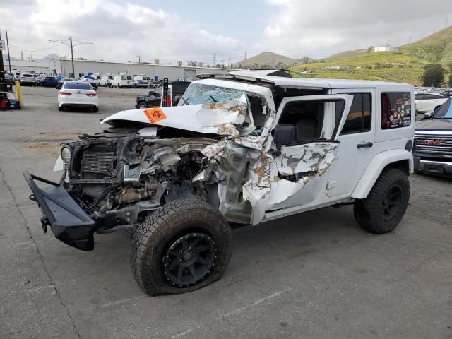 JEEP WRANGLER U 2016 مع رقم تعريف المركبة 1C4BJWEG0GL268764 - صورة من المزاد