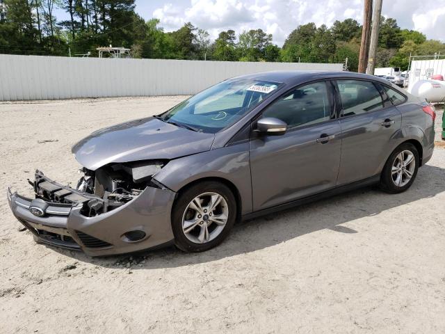 FORD FOCUS SE 2014 with VIN 1FADP3F23EL372645 - Photo from auction