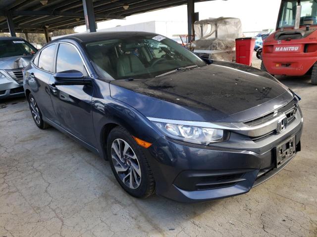 Photo 4 from auction – 2018 HONDA CIVIC EX with VIN 19XFC2F77JE205387