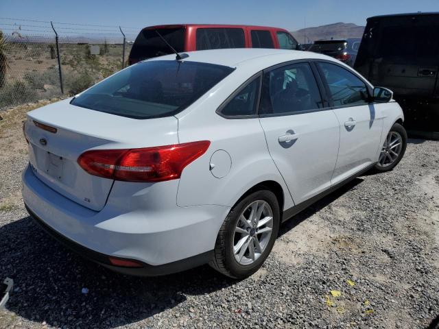 Photo 3 from auction – 2015 FORD FOCUS SE with VIN 1FADP3F22FL329321