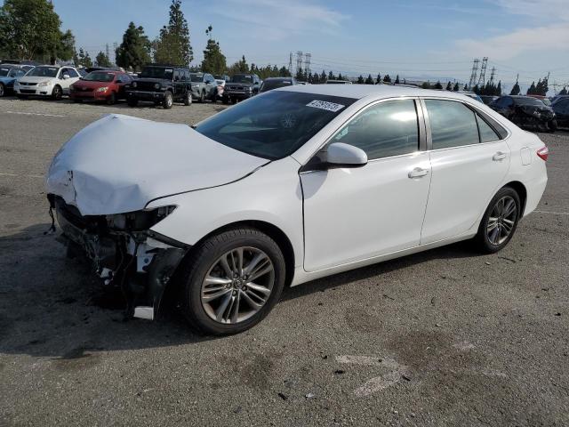 TOYOTA CAMRY LE 2016 with VIN 4T1BF1FK8GU219311 - Photo from auction