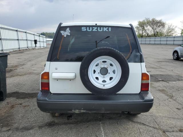 Photo 6 from auction – 1997 SUZUKI SIDEKICK S with VIN JS3TD21V7V4104574