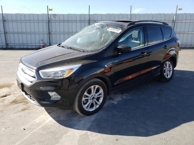 FORD ESCAPE SE 2018 with VIN 1FMCU0GD1JUA58120 - Photo from auction