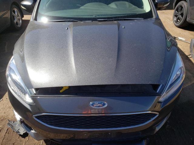 Photo 11 from auction – 2015 FORD FOCUS SE with VIN 1FADP3F22FL218641