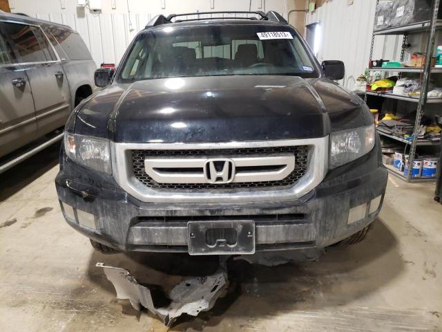 Photo 5 from auction – 2011 HONDA RIDGELINE with VIN 5FPYK1F50BB004163