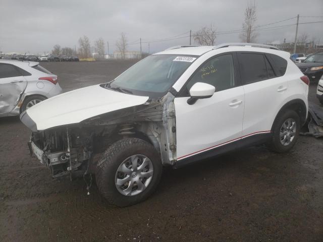 MAZDA CX-5 SPORT 2014 with VIN JM3KE2BE7E0314158 - Photo from auction