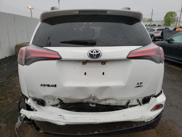 Photo 6 from auction – 2018 TOYOTA RAV4 LE with VIN JTMBFREV8JJ739919