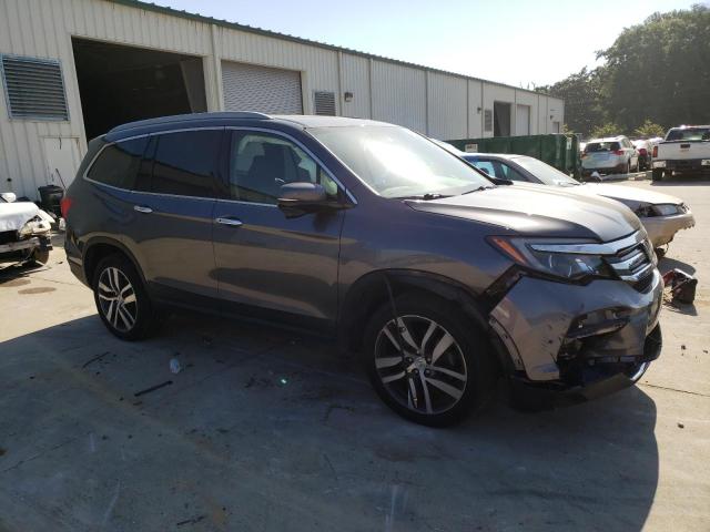 Photo 4 from auction – 2017 HONDA PILOT TOUR with VIN 5FNYF6H99HB039190