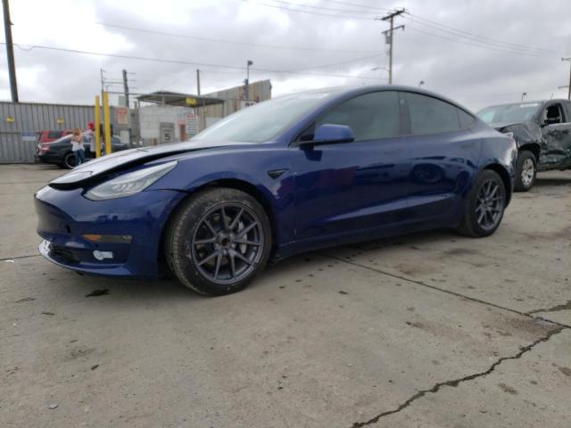 TESLA MODEL 3 2021 with VIN 5YJ3E1EA7MF987404 - Photo from auction