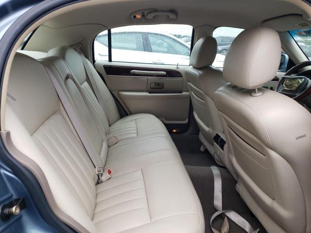 Photo 10 from auction – 2004 LINCOLN TOWN CAR E with VIN 1LNHM81W44Y612147