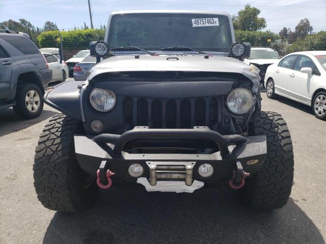 Photo 5 from auction – 2014 JEEP WRANGLER S with VIN 1C4AJWAG4EL146424