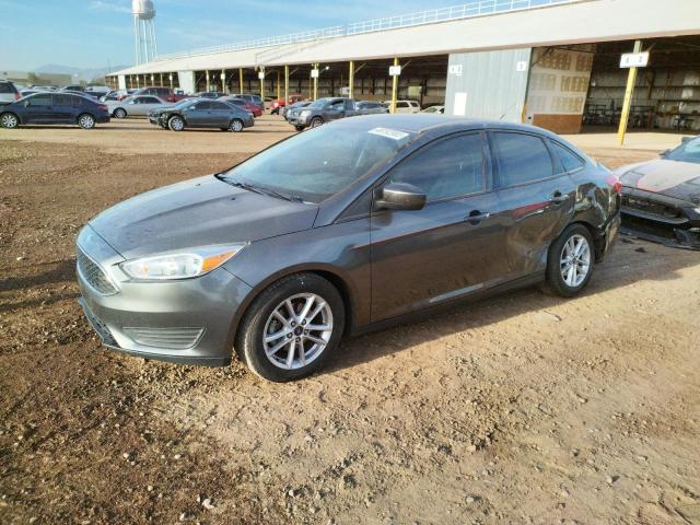 FORD FOCUS SE 2018 with VIN 1FADP3FE8JL322828 - Photo from auction