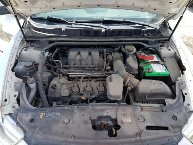 Photo 11 from auction – 2014 FORD TAURUS POL with VIN 1FAHP2MK3EG156348