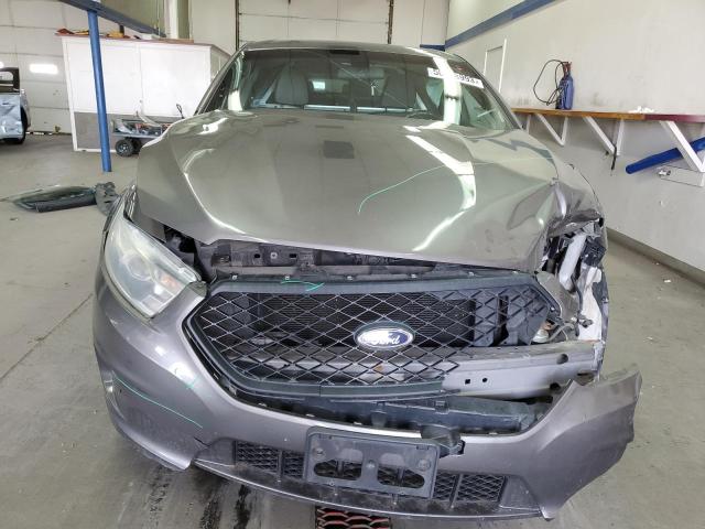 Photo 5 from auction – 2014 FORD TAURUS POL with VIN 1FAHP2MK5EG124470