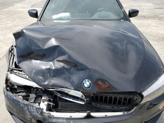 Photo 11 from auction – 2019 BMW 530E with VIN WBAJA9C50KB388493