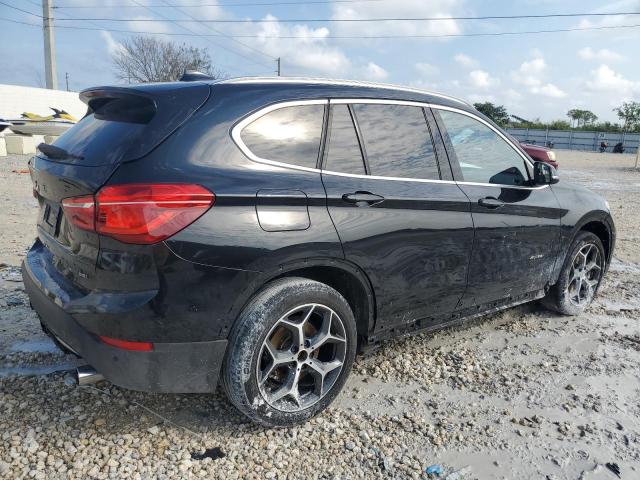Photo 3 from auction – 2017 BMW X1 XDRIVE2 with VIN WBXHT3C35H5F70453