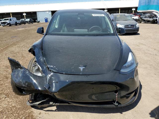 Photo 5 from auction – 2023 TESLA MODEL Y with VIN 7SAYGDEE3PF616249