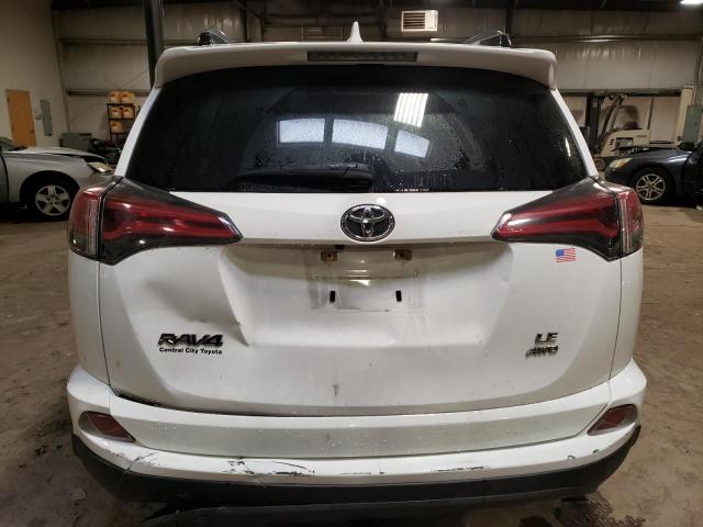 Photo 6 from auction – 2018 TOYOTA RAV4 LE with VIN JTMBFREV0JJ218385
