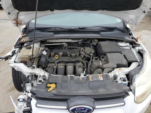Foto 11 de la subasta – 2014 FORD FOCUS SE con VIN 1FADP3K29EL298296