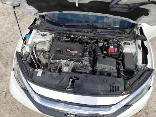 Photo 11 from auction – 2018 HONDA CIVIC EX with VIN 19XFC2F73JE007678