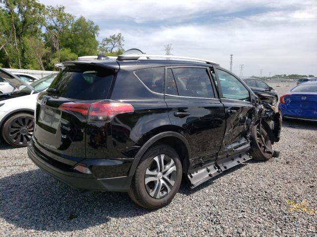 Photo 3 from auction – 2018 TOYOTA RAV4 LE with VIN 2T3ZFREV1JW512409