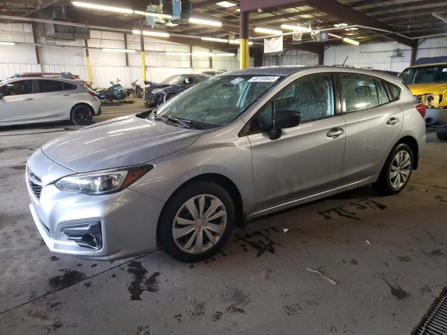 SUBARU IMPREZA 2017 with VIN 4S3GTAA65H3707457 - Photo from auction
