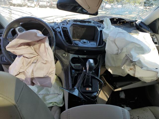 Photo 8 from auction – 2014 FORD ESCAPE TIT with VIN 1FMCU9J9XEUC38100