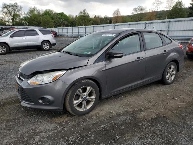FORD FOCUS SE 2014 with VIN 1FADP3F21EL386723 - Photo from auction