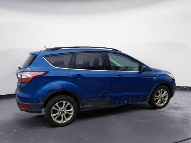 Photo 3 from auction – 2018 FORD ESCAPE SE with VIN 1FMCU0GD4JUD51803
