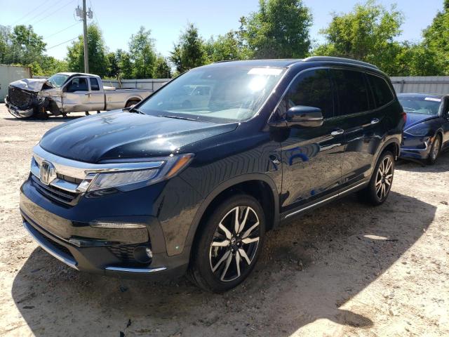 HONDA PILOT TOUR 2019 with VIN 5FNYF5H61KB043144 - Photo from auction