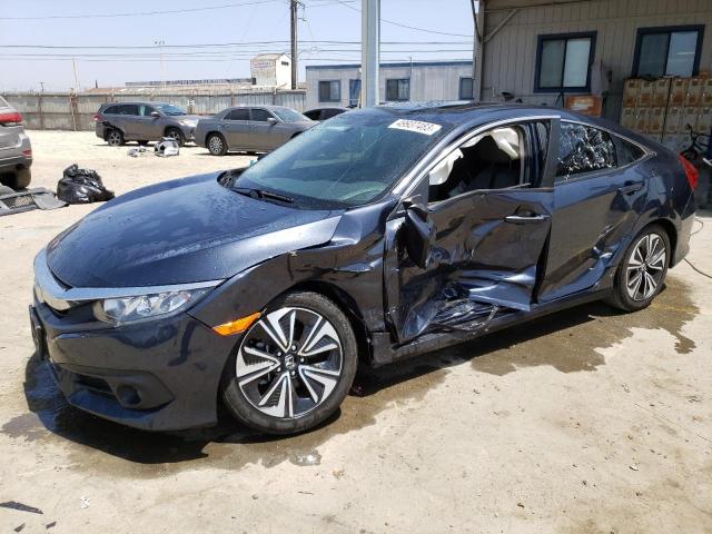 Photo 1 from auction – 2018 HONDA CIVIC EX with VIN JHMFC1F3XJX002175