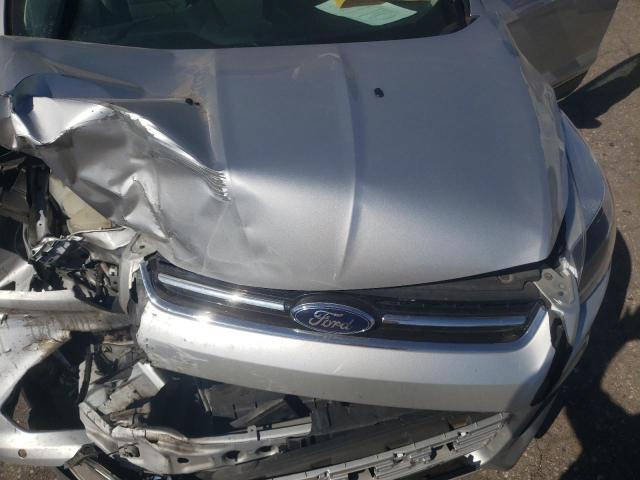 Photo 12 from auction – 2014 FORD ESCAPE TIT with VIN 1FMCU0J95EUD64859