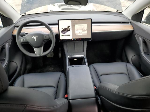 Photo 8 from auction – 2022 TESLA MODEL Y with VIN 7SAYGDEE2NF481908