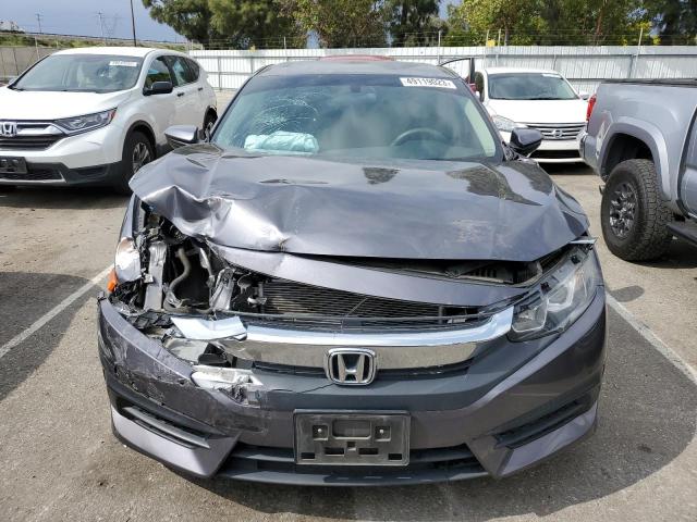 Photo 5 from auction – 2017 HONDA CIVIC LX with VIN 2HGFC2F51HH558335