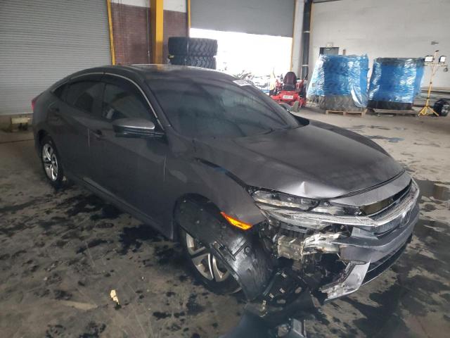 Photo 4 from auction – 2018 HONDA CIVIC EX with VIN 19XFC2F76JE033028