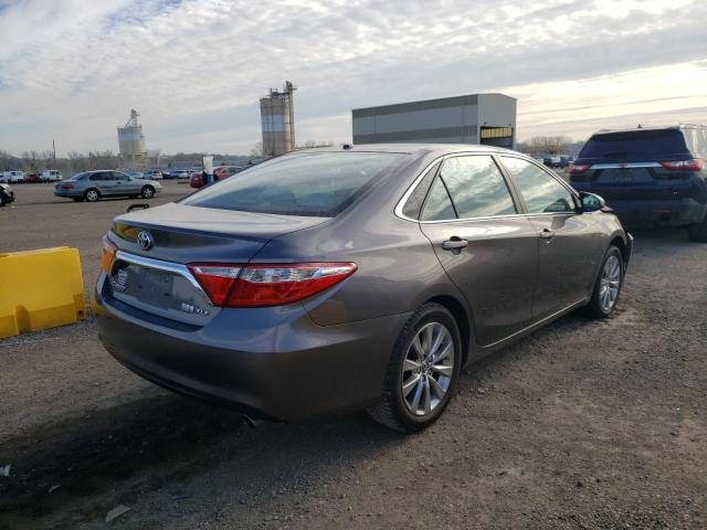Photo 3 from auction – 2016 TOYOTA CAMRY HYBR with VIN 4T1BD1FK8GU178278